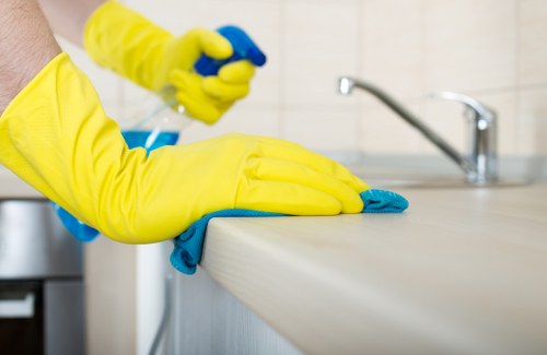 Cleaning team preparing for a carpet care visit with service notes