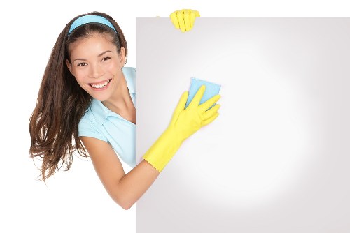 Local curtain cleaner working in a Swisscottage apartment building